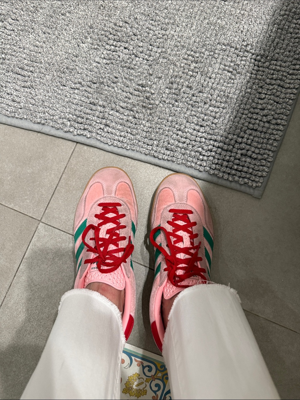 Adidas Gazelle Indoor shoes in Glow Pink with Court Green stripes and red laces